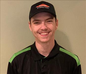 Headshot of Steven in his SERVPRO uniform shirt and hat